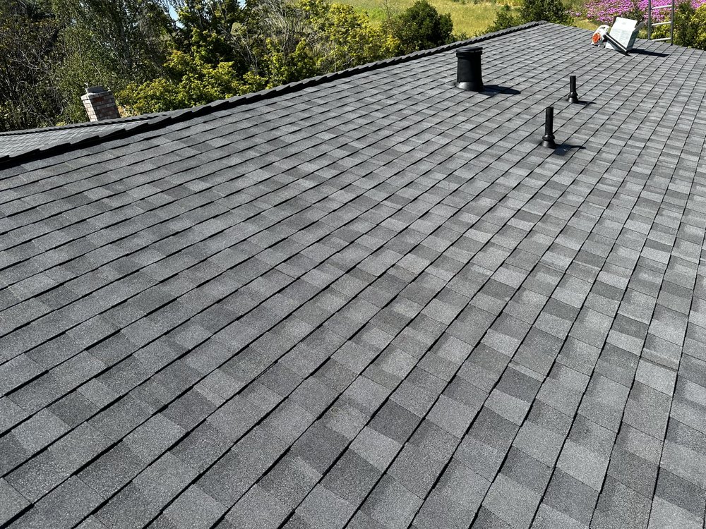 Slide of McMillan Roofing