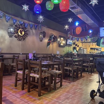Dos Amigos - tables and chairs in a restaurant - Mexican Near Me - Pompano Beach, Florida Dos Amigos - tables and chairs in a restaurant - Mexican Near Me - Pompano Beach, Florida