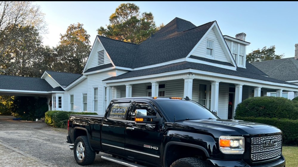 Slide of Akurate Roofing Group