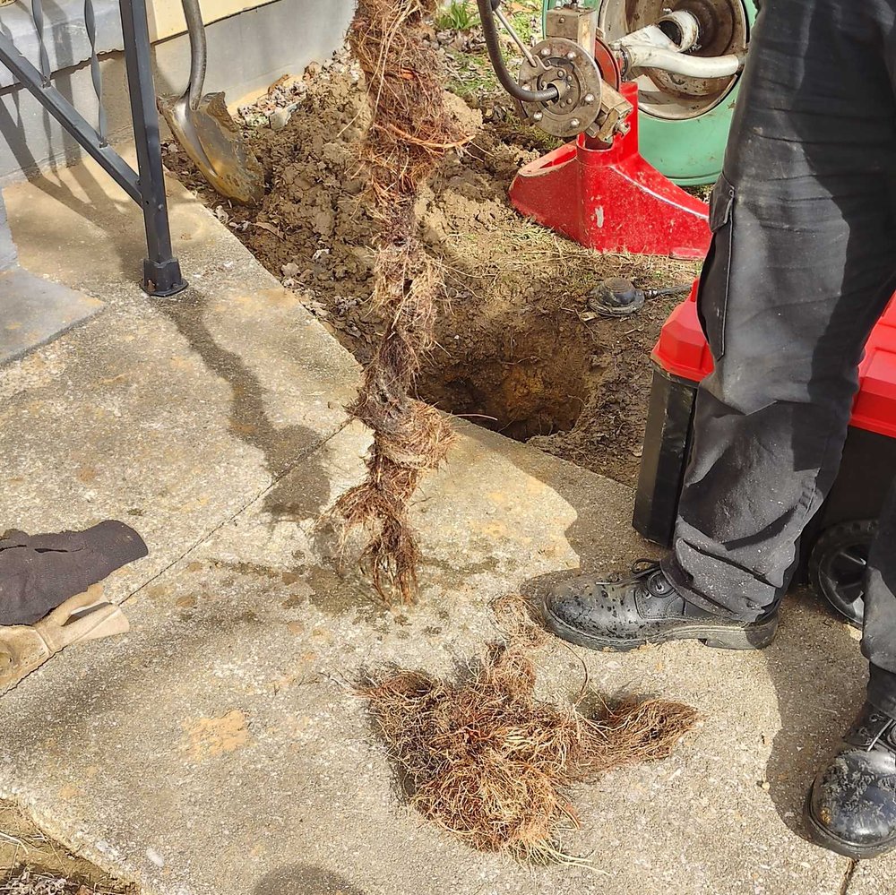 Slide of Mike's Drain Service