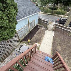 Moils Lawn and Landscape - Brand new mulch bed with trellis