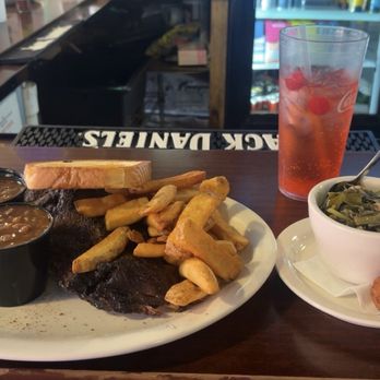 Blues City Cafe - Half Rack of BBQ Ribs* with baked beans, steak fries and turnip greens - Southern Near Me - Memphis, Tennessee Blues City Cafe - Half Rack of BBQ Ribs* with baked beans, steak fries and turnip greens - Southern Near Me - Memphis, Tennessee