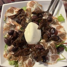 Insalata Gallipoli Organic lettuce, arugula, kalamata olives, sundried tomatoes, bondiola meat slices, and burrata cheese. Insalata Gallipoli Organic lettuce, arugula, kalamata olives, sundried tomatoes, bondiola meat slices, and burrata cheese.