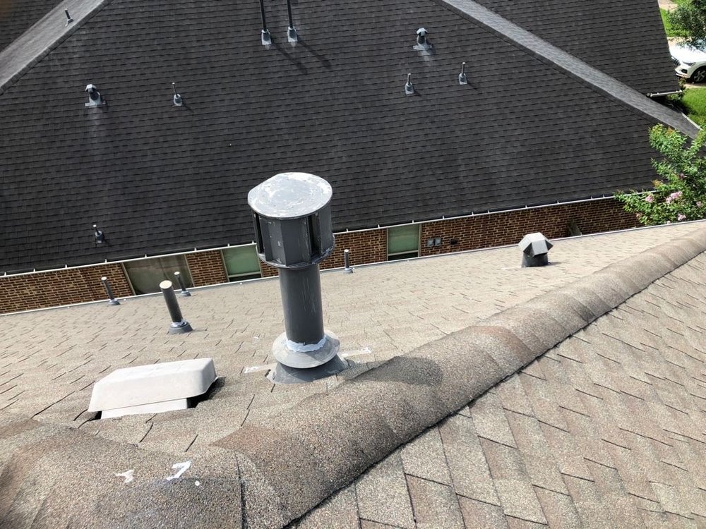 Slide of Bustamante Roofing and Construction