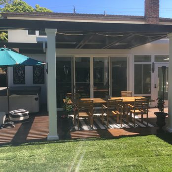 JD Innovations - a patio with a table and chairs - General Contractors Near Me - Tustin, California JD Innovations - a patio with a table and chairs - General Contractors Near Me - Tustin, California