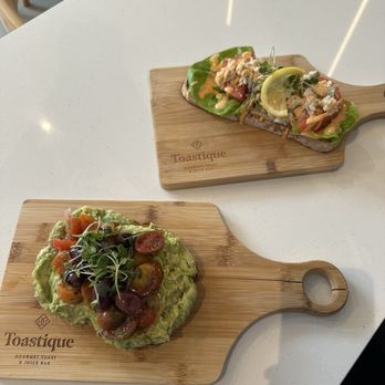 Toastique - Avocado Smash Toast and Lump Crab - Juice Bars & Smoothies Near Me - Charlotte, North Carolina Toastique - Avocado Smash Toast and Lump Crab - Juice Bars & Smoothies Near Me - Charlotte, North Carolina
