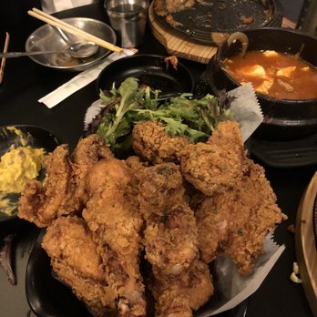 Kong Pocha - Fried chicken (bone-in) and some half eaten soondooboo in the background - Korean Near Me - Baltimore, Maryland Kong Pocha - Fried chicken (bone-in) and some half eaten soondooboo in the background - Korean Near Me - Baltimore, Maryland