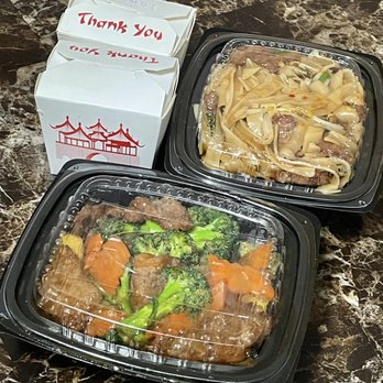 Huang's Ya Ting - two take out containers of food - Asian Fusion Near Me - Aurora, Colorado