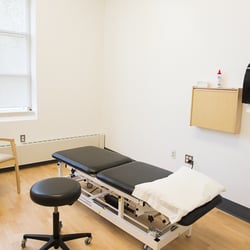 Ryan Center for Sports Medicine - A private physical therapy room.