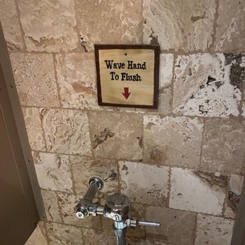 The Mansion - Funny art in bathroom - New American Near Me - Melbourne, Florida