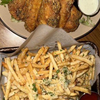 Station 16 - Lemon pepper wings and Parmesan truffle fries - Cocktail Bars Near Me - Elk Grove, California Station 16 - Lemon pepper wings and Parmesan truffle fries - Cocktail Bars Near Me - Elk Grove, California