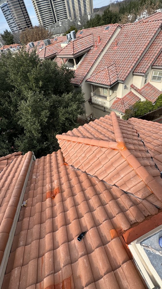 Slide of New Elite Roofing