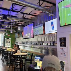 Hops And Berry Taproom - Photo of all the selection of taps