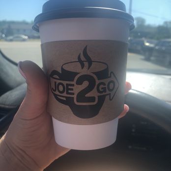 Joe 2 Go - a hand holding a cup of coffee - Coffee & Tea Near Me - Prairie du Chien, Wisconsin Joe 2 Go - a hand holding a cup of coffee - Coffee & Tea Near Me - Prairie du Chien, Wisconsin
