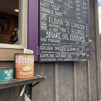 Snake Oil Coffee Company - a menu on the wall - Coffee & Tea Near Me - Moab, Utah Snake Oil Coffee Company - a menu on the wall - Coffee & Tea Near Me - Moab, Utah