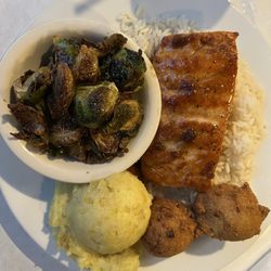 The Catch - Brown Sugar glazed salmon over white rice. Mashed potatoes, Brussels sprouts, hush puppies
