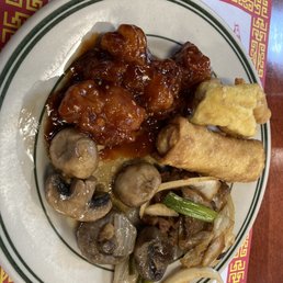 Egg rolls, mushrooms, orange chicken, Mongolian beef Egg rolls, mushrooms, orange chicken, Mongolian beef