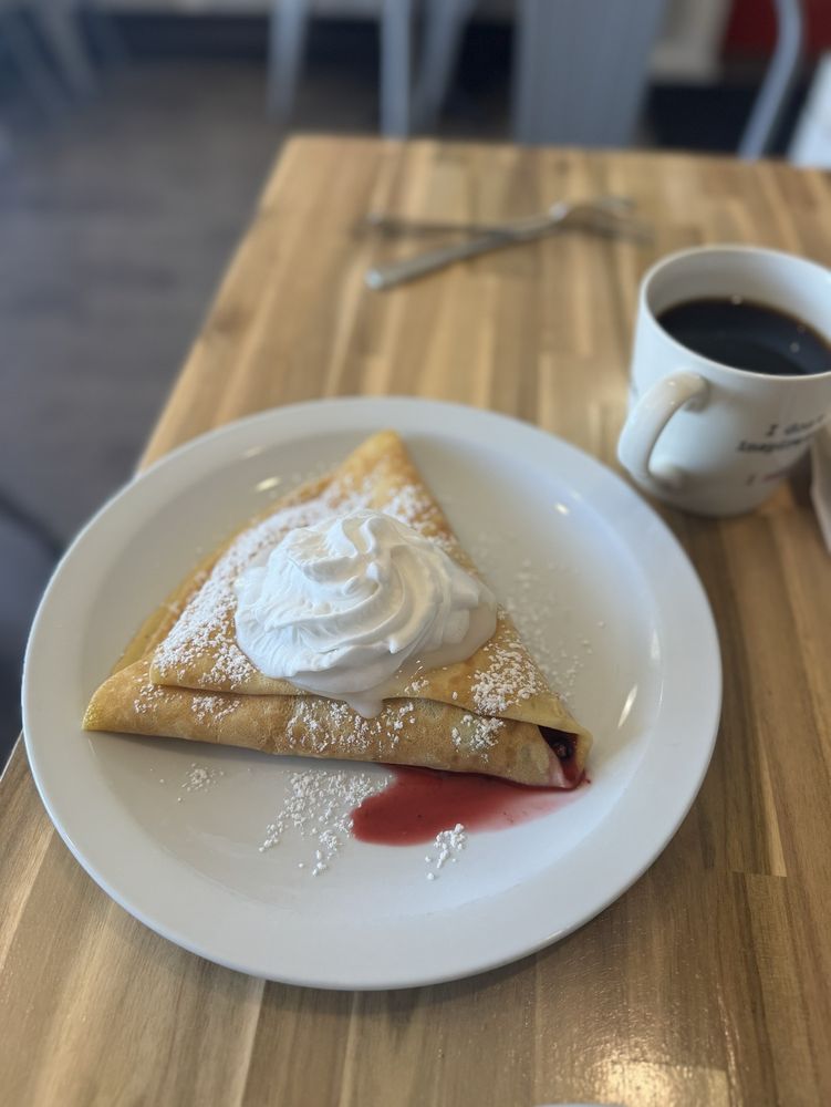 Ironworks Cafe and Crêperie Logo