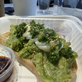 Chance’s Coffee - Avocado toast came with boiled eggs, scallion oil and chili crisp, it definitely brought avocado toast to another taste bud level. - Coffee & Tea Near Me - San Diego, California Chance’s Coffee - Avocado toast came with boiled eggs, scallion oil and chili crisp, it definitely brought avocado toast to another taste bud level. - Coffee & Tea Near Me - San Diego, California