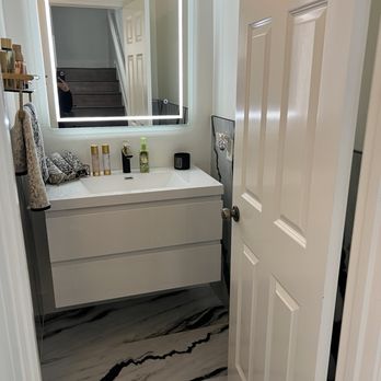 Reingold Construction - Floating Vanity and Lighted Mirror installation - General Contractors Near Me Reingold Construction - Floating Vanity and Lighted Mirror installation - General Contractors Near Me