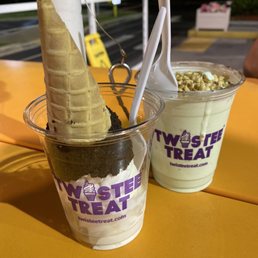 Vanilla ice cream in oreo waffle cone put in a cup cause its Florida and ice creams melts quick. Pistachio topped with peanuts.