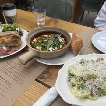 Nonna Mercato - Left to right: Bologna vs Romana, Baked Eggs, and Caesar salad. - Bakeries Near Me - Long Beach, California