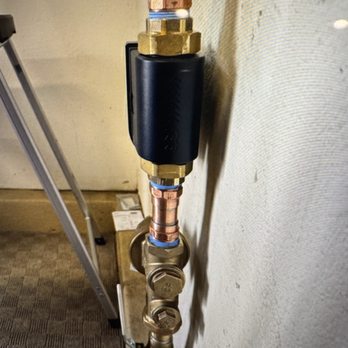 All American Plumbing - Side view of new installed Moen water monitor/shut off device, new PRV, piping and manual shutoff valve - Plumbing Near Me - Poway, California All American Plumbing - Side view of new installed Moen water monitor/shut off device, new PRV, piping and manual shutoff valve - Plumbing Near Me - Poway, California
