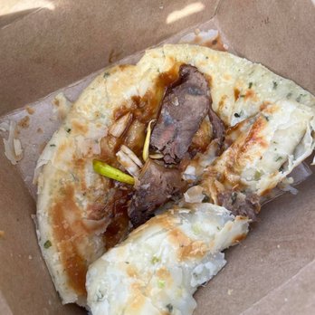 Dumpling Kitchen - Exhibit A: 2 slices of thinly sliced meat (2 other slices not in pic) with a slap of BBQ sauce - Shanghainese Near Me - Berkeley, California