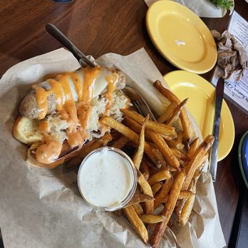 Border Burger Bar - Beef brats with fries. The sauce on the dog was delicious. - Burgers Near Me - Manitou Springs, Colorado Border Burger Bar - Beef brats with fries. The sauce on the dog was delicious. - Burgers Near Me - Manitou Springs, Colorado