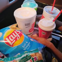 Speedway - Crunch donuts, salt and vinegar chips, cup of ice, blue raspberry slushy, Coke, and a wild cherry slushy.