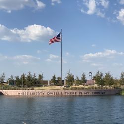 Heroes Memorial Park - Lovely pond with flagpole in the center