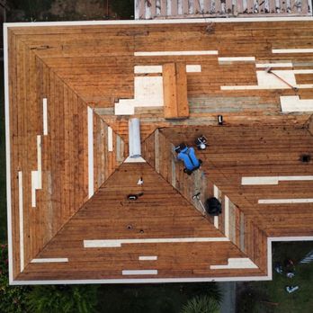 Top Roofing Services - Drone photo of roof after tear-off, showing repair work underway (photo provided by Top Roofing) - Roofing Near Me - Anaheim, California Top Roofing Services - Drone photo of roof after tear-off, showing repair work underway (photo provided by Top Roofing) - Roofing Near Me - Anaheim, California