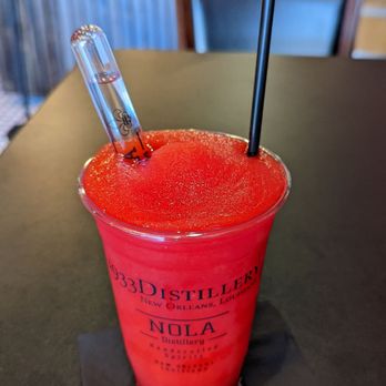 NOLA Distillery - a red drink in a plastic cup - Distilleries Near Me - New Orleans, Louisiana NOLA Distillery - a red drink in a plastic cup - Distilleries Near Me - New Orleans, Louisiana