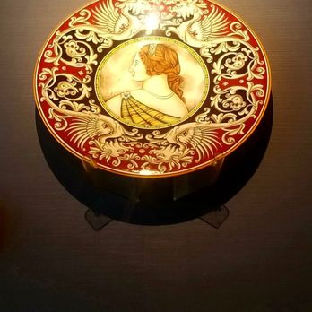 Caffè Umbria - a lit candle on a decorative plate - Coffee & Tea Near Me - Seattle, Washington Caffè Umbria - a lit candle on a decorative plate - Coffee & Tea Near Me - Seattle, Washington