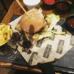 Mangetout Grill And Steak House - Vegan seitan burger with fries and bbq sauce.