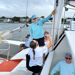 Lookout Cruises - Hubby helping to hoist the main sail