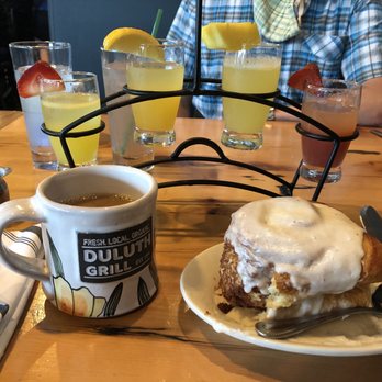 Duluth Grill - Alakef decaf and a fresh-out-of-the-oven Cinnamon Roll with cardamom frosting. - Breakfast & Brunch Near Me - Duluth, Minnesota