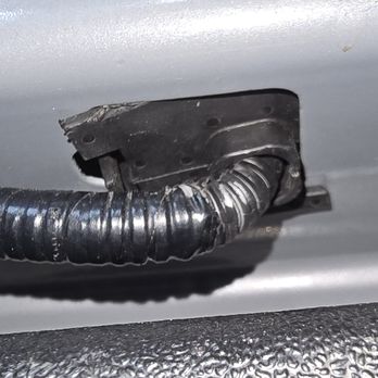 Alpha Collision Center - One of the broken tailgate retainer clips I had to replace - Body Shops Near Me - Chino, California Alpha Collision Center - One of the broken tailgate retainer clips I had to replace - Body Shops Near Me - Chino, California