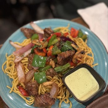 OMELI Kitchen - Shaken Beef Garlic Noodles - Vietnamese Near Me - Fullerton, California OMELI Kitchen - Shaken Beef Garlic Noodles - Vietnamese Near Me - Fullerton, California
