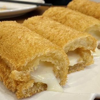 JOY Cafe - Fried cruller shaped thingy with creamy filling - Cafes Near Me - Vancouver, British Columbia JOY Cafe - Fried cruller shaped thingy with creamy filling - Cafes Near Me - Vancouver, British Columbia