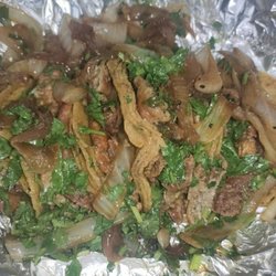 Taqueria Jalisco - Order of mixed crispy tripas with bistek. Each taco has both meats in the mixed.