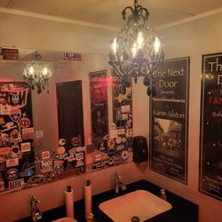 TND Deuce Pizza Bar - Best-looking men's room I've seen in a dive bar. Chandeliers, stickers, attitude everywhere.