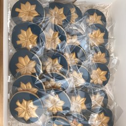 a box of decorated cookies a box of decorated cookies