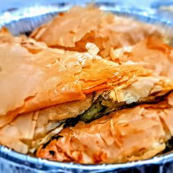 Lourdas Greek Taverna - Spanakopites: spinach and feta cheese wrapped in flaky phyllo dough.