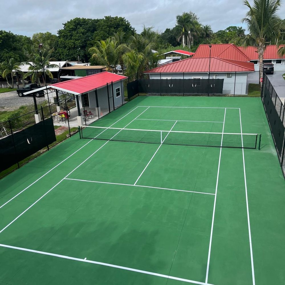 Florida Keys tennis courts with palm trees. FloridaKeysVillas.com