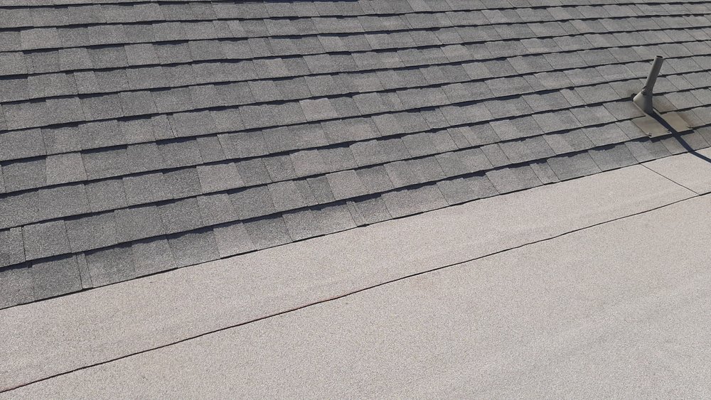 Slide of El Puma Roofing