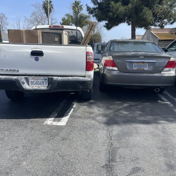 Park at your own risk, you're better off parking on the street.