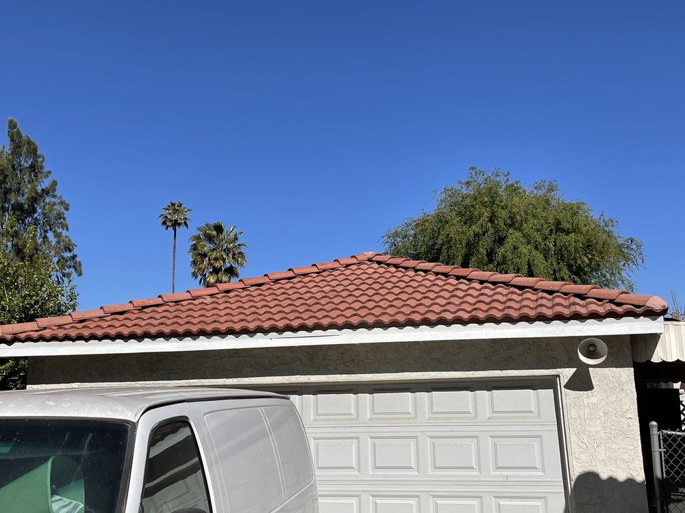 Slide of Mena Roofing