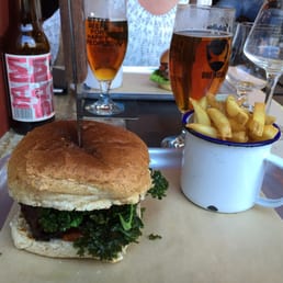 The vegan burger - seitan burger with crispy kale, tomato chutney and hummus