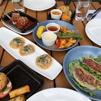 STK Steakhouse Bellevue - Happy hour spread Burger, Beef Tartare, Meatballs, Tots, Calamari, Tuna Taco - Steakhouses Near Me - Bellevue, Washington STK Steakhouse Bellevue - Happy hour spread Burger, Beef Tartare, Meatballs, Tots, Calamari, Tuna Taco - Steakhouses Near Me - Bellevue, Washington